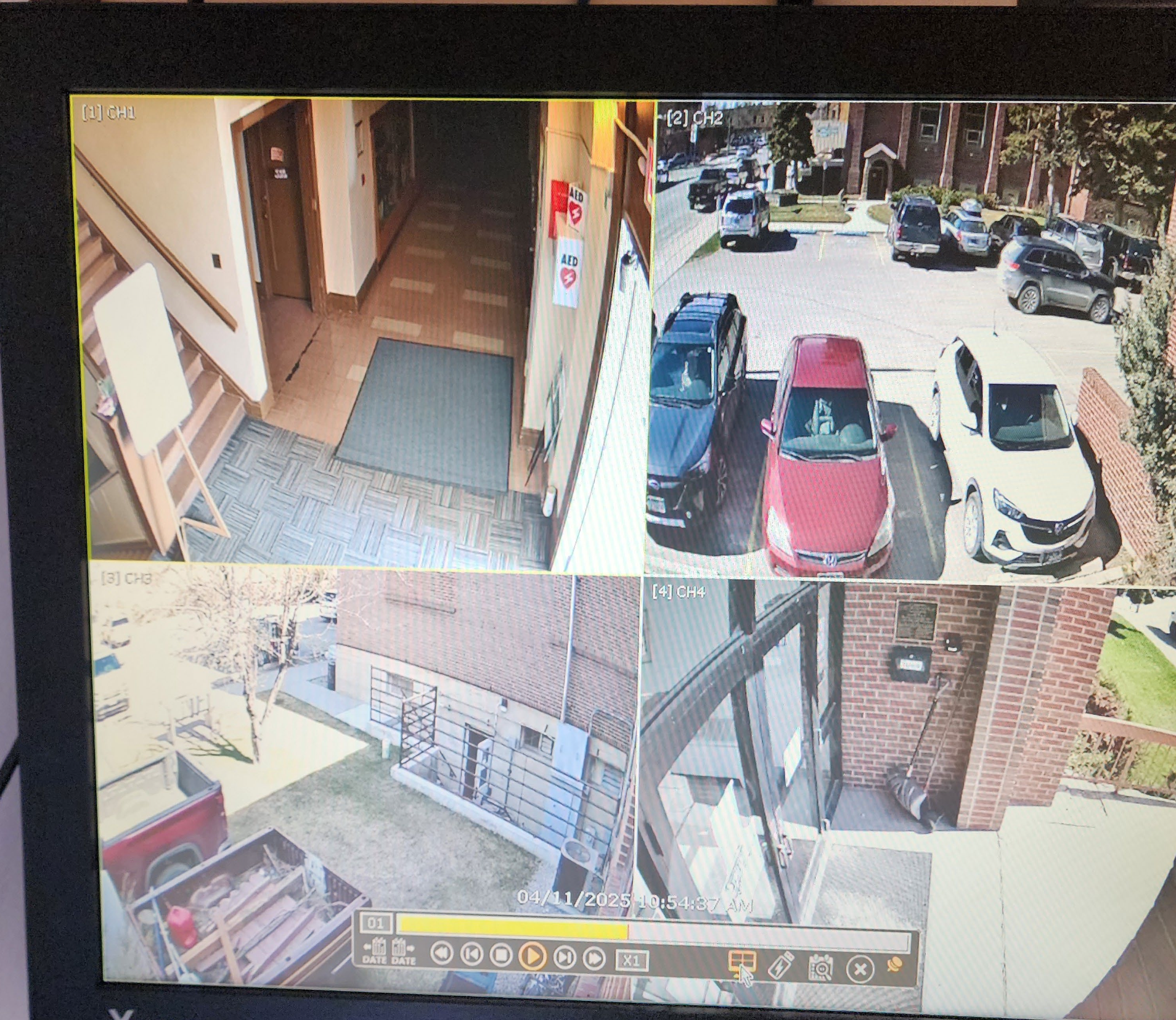 Camera Control Board, the 4 installed cameras with live views of Parish Center, hallways and entrances.